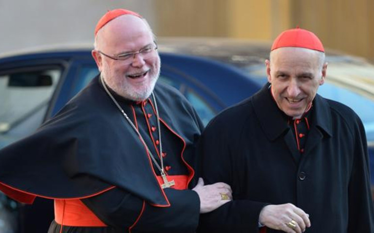 Los cardenales Reinhard Marx (izquierda) y Severino Poletto (derecha)