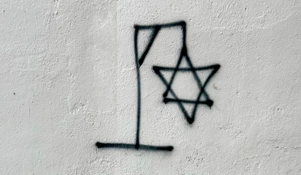 Pintada de una estrella de David colgada de una horca en Madrid