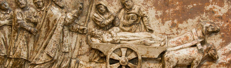 La santa en la carreta tras su muerte