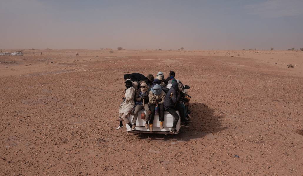 Refugiados africanos entrando en territorio libio.