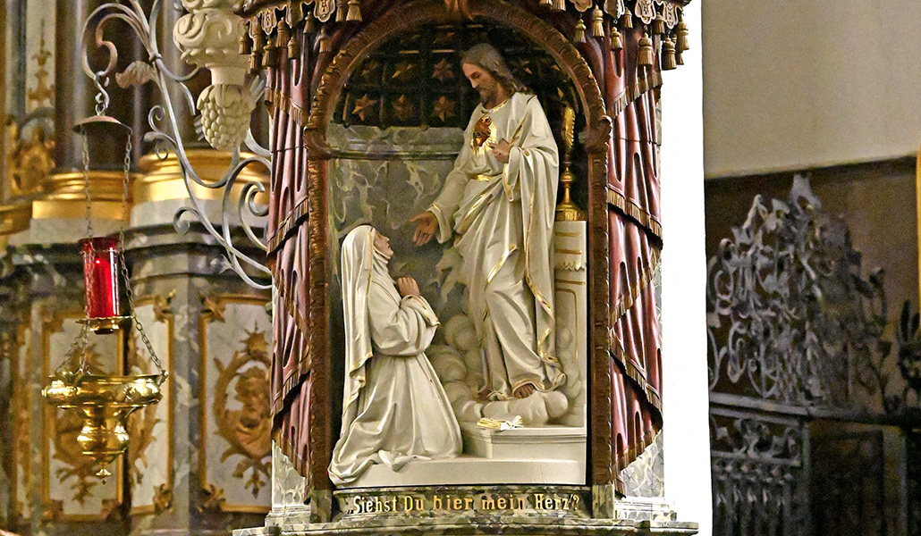 El Sagrado Corazón de Jesús y la santa en la iglesia de San Nicolás de Eupen (Bélgica).